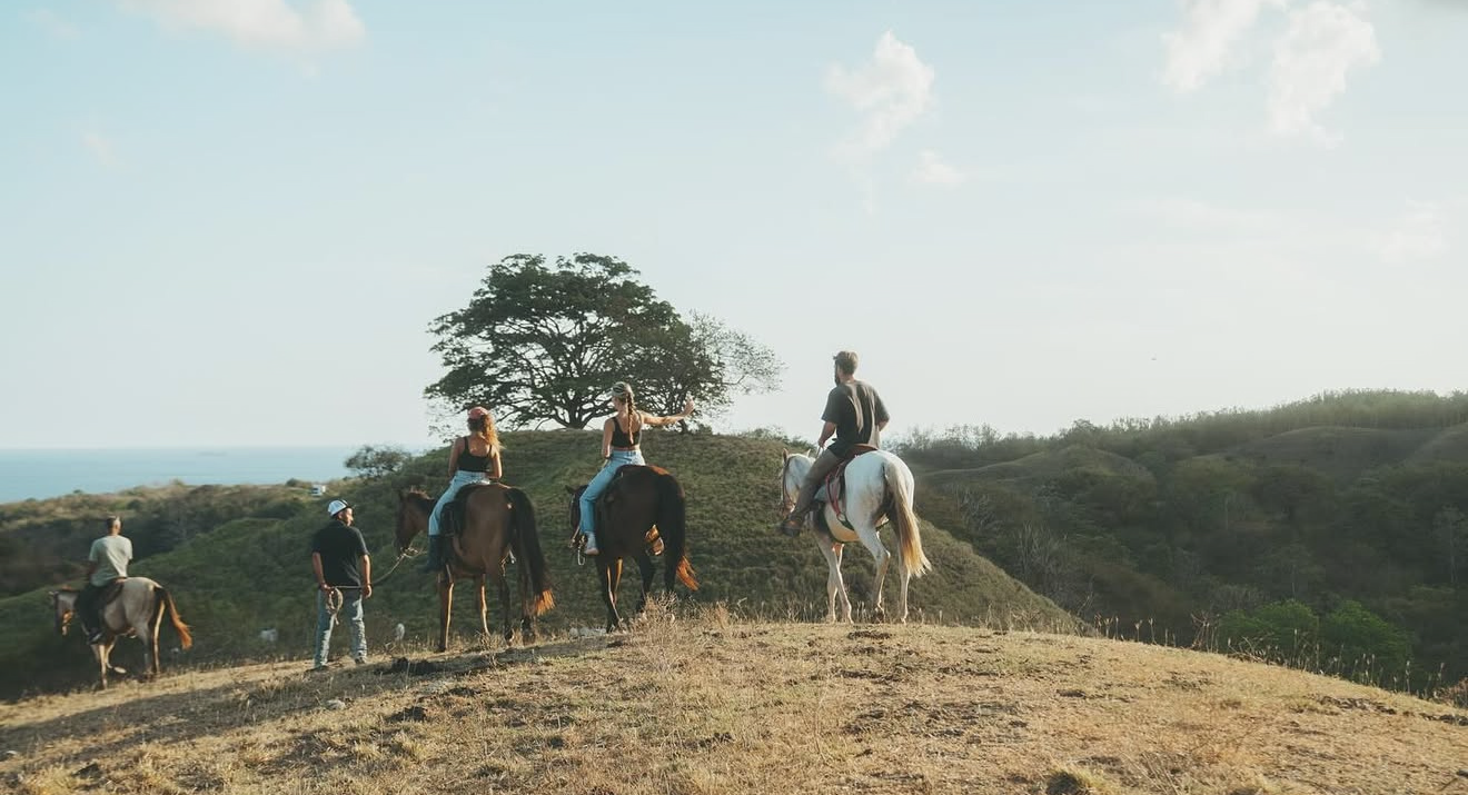 A group on a custom horseback and beach adventure